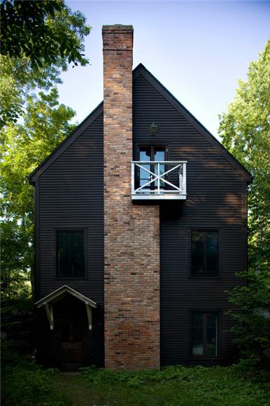 Surrounded Lush Greenery - Black House Exterior Design
